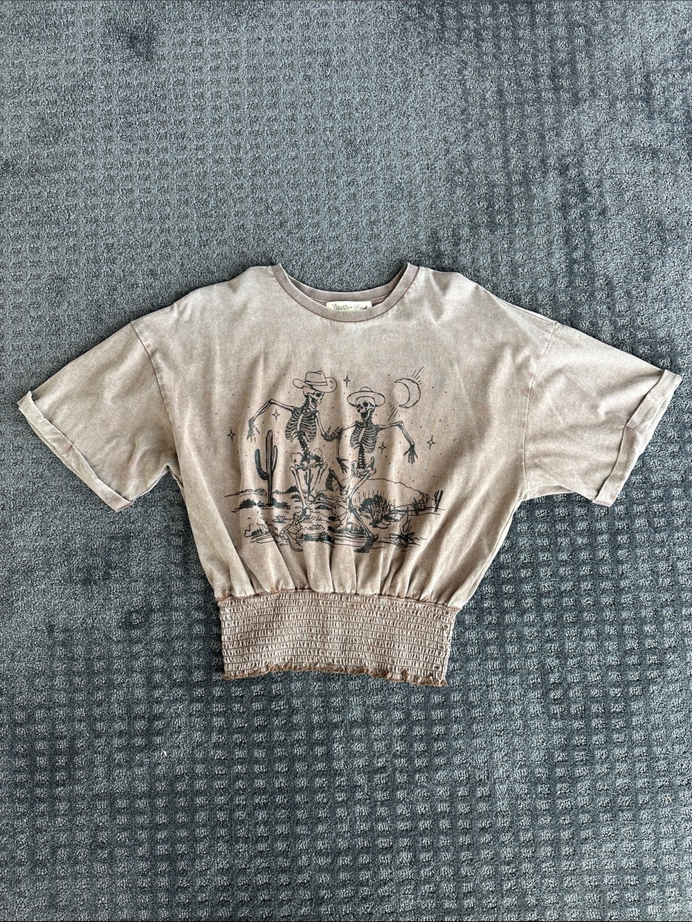 Smocked-Waist Beige Graphic Tee with Desert Skeleton Print